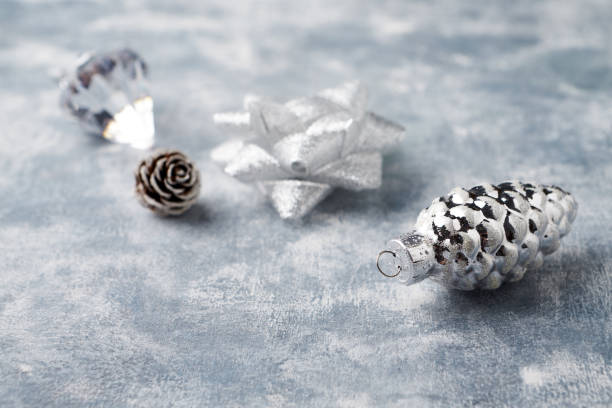 istock Christmas baubles on bright wooden background. Close up. 1180647615