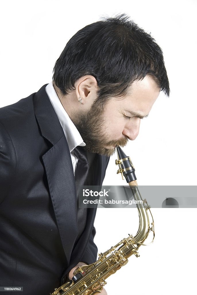 Hombre de negocios tocando el saxofón - Foto de stock de Adulto libre de derechos