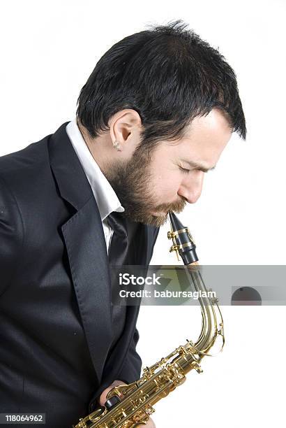 Hombre De Negocios Tocando El Saxofón Foto de stock y más banco de imágenes de Adulto - Adulto, Blues, Boquilla - Equipo musical