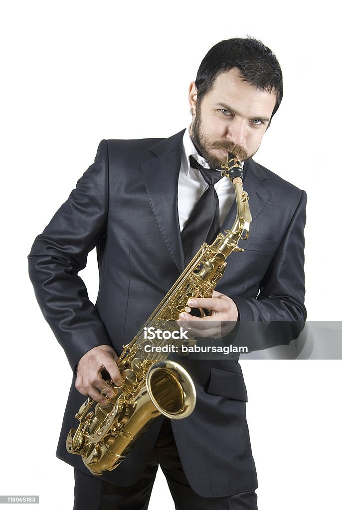 Homme d'affaires jouant au saxophone - Photo de Jazz libre de droits