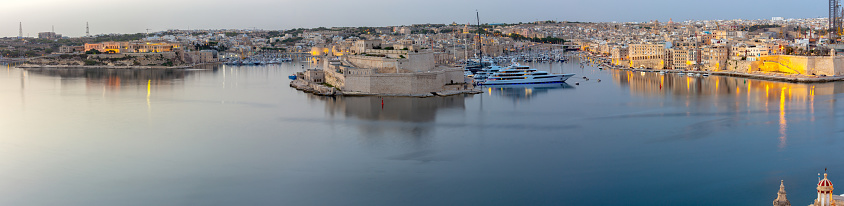 Scenic panoramic view of the city and bay at sunrise. Malta. Valletta.