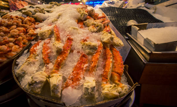 istock crabs legs on ice at a fish market 1180661234