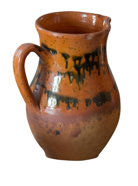 istock clay jug isolated on a white background. vintage jug front view. 1180661274
