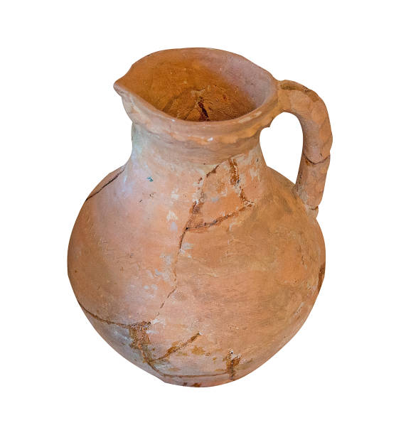 istock clay jug isolated on a white background. vintage jug front view. 1180661281
