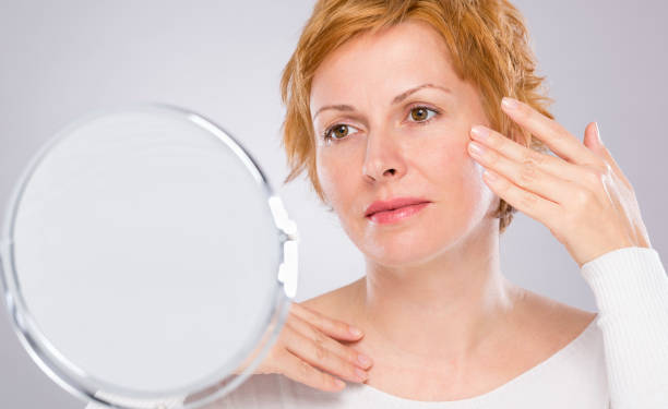 istock Woman with short red hair 1180666091
