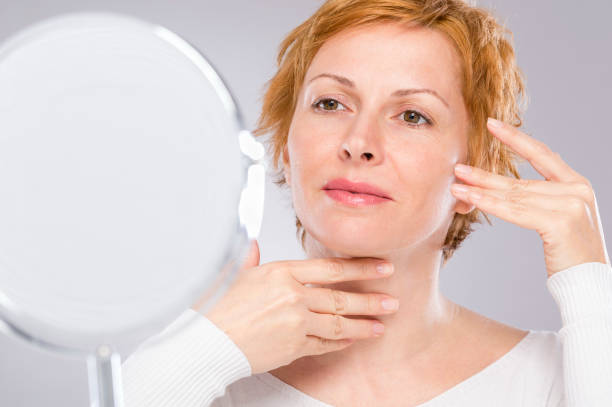 istock Woman with short red hair 1180666167