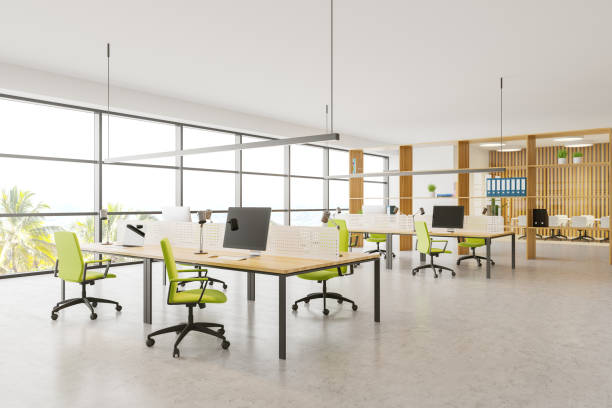 istock Bright wooden open space office with meeting room 1180671541