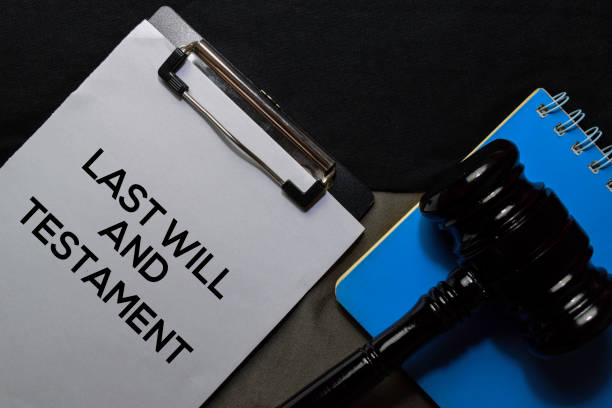 istock Last Will and Testament text on Document and gavel isolated on office desk. Law concept 1180674488