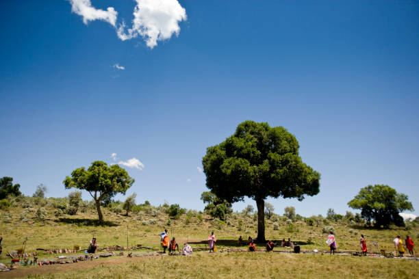 Maasai Mara, Kenya | October 18, 2007: Maasai people trading their arts and crafts to tourists, Kenya, East Africa