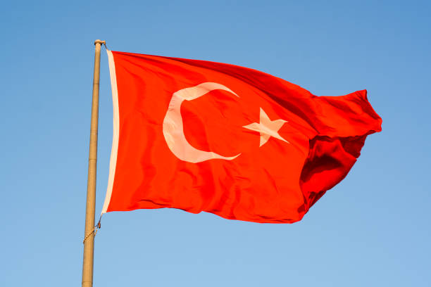 istock Turkish flag waving in the wind 1180677723