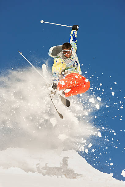 istock Skier Making Incredible Jump In Powder Snow 118067926