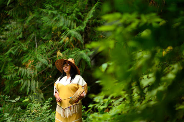 istock First Nations woman performing a welcome song 1180684226