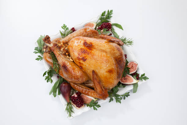 istock Traditional Roasted Turkey on White 1180684390
