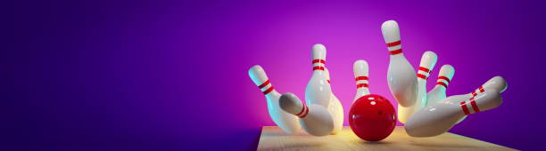 istock Bowling strike - ball hitting pins in the alley 3d render 1180684438