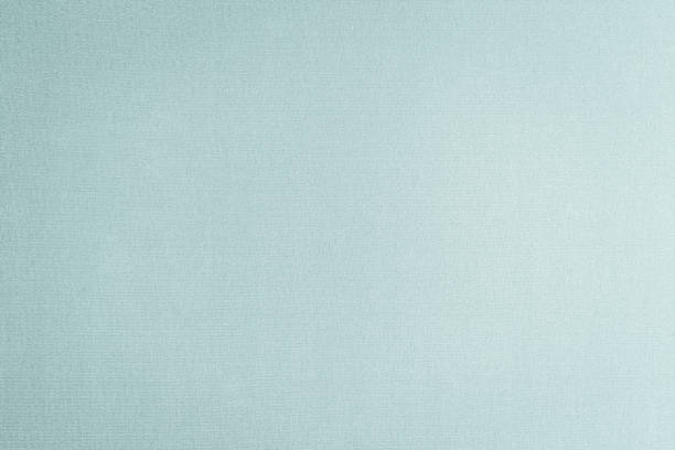 istock Silk fabric wallpaper texture pattern background in light pale blue green teal color tone 1180686905