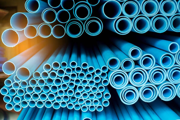 istock Close up to blue plastic pipe background, PVC pipes stacked in warehouse 1180689128