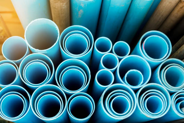 istock Close up to blue plastic pipe background, PVC pipes stacked in warehouse 1180689132