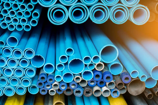 istock Close up to blue plastic pipe background, PVC pipes stacked in warehouse 1180689154