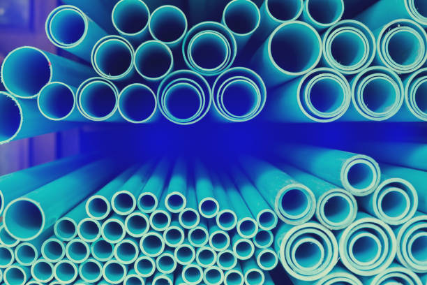 istock Close up to blue plastic pipe background, PVC pipes stacked in warehouse 1180689161