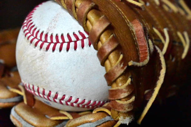 istock Baseball in Baseball Glove 1180705768
