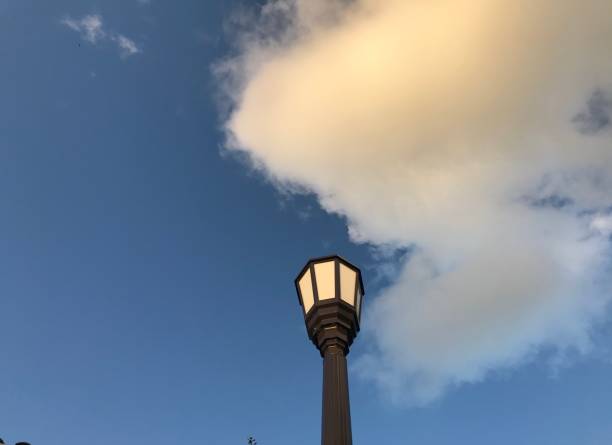 istock Lantern light against blue cloud in the sky 1180711518
