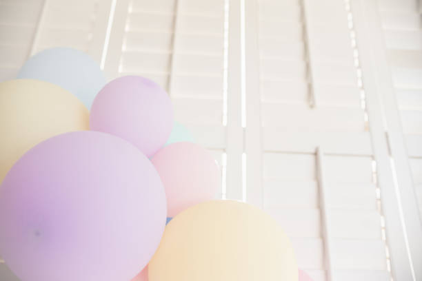 Xanthi, Greece - March 10, 2019: Confetti balloons at Xanthi Carnival, low-angle view
