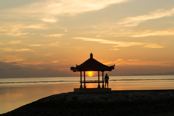 istock Silhouette of a small pavilion during sunrise 1180718541
