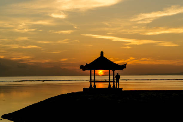 istock Silhouette of a small pavilion during sunrise 1180718720