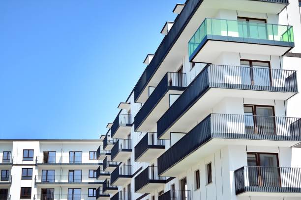istock Modern apartment buildings on a sunny day with a blue sky. 1180726418