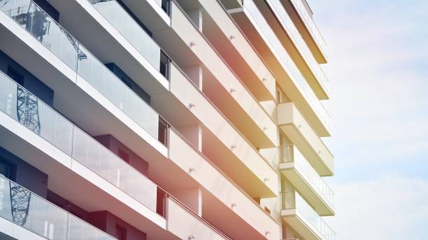 istock Modern apartment building detail, glass surface with sunlight 1180727291