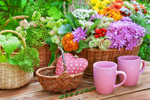 Garden flowers and two mugs