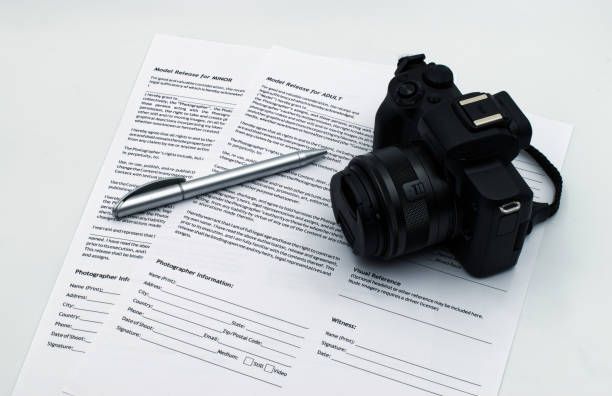 istock Model Release for adult and for minor documents, isolated on white background. 1180732835