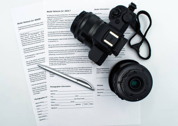 istock Model Release for adult and for minor documents, isolated on white background. 1180732838