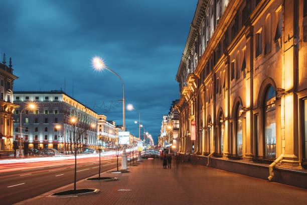 istock Minsk, Belarus. Traffic On Independence Avenue In Evening Night Illuminations 1180732998