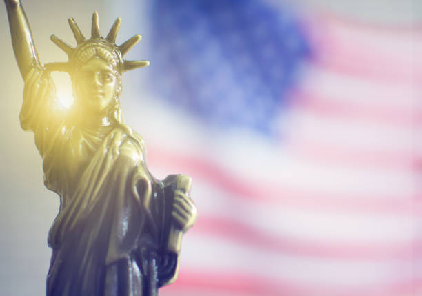 istock Statue of Liberty with the light behind 1180735643