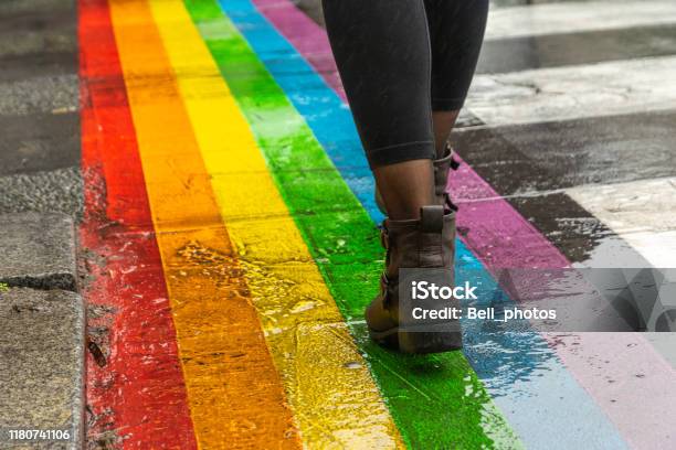 Legs Walking On Gay Rainbow Crosswalk Stock Photo - Download Image Now - LGBTQIA Pride Event, Rainbow, Gay Pride Parade