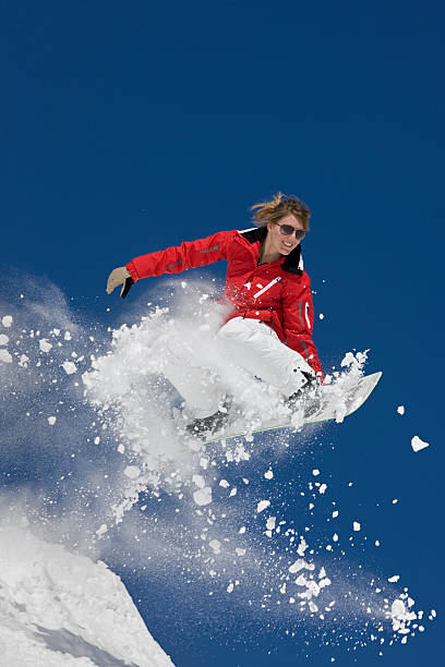 istock Snowboarder Jumping High In The Air 118074660