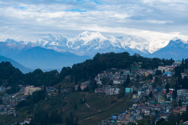 istock Darjeeling City on hill with mountains and clouds background, India 1180750638
