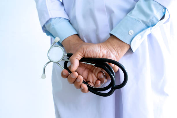 istock Back side of a doctor hold stethoscope 1180751726