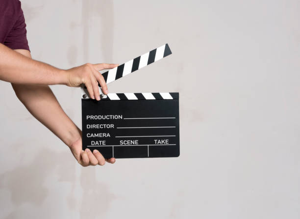 istock Movie Slate board in hand 1180753138