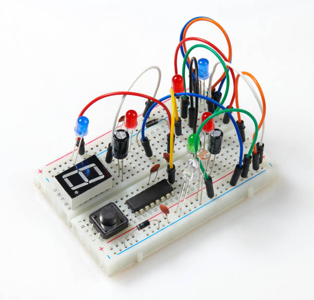 istock circuit mounting plate with mounted electronic component, unit, part, radio equipment and digital microchip - DIY kit for learning, training and development of electric circuits 1180753467