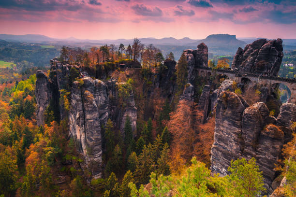 istock Pedestrian medieval Bastei stone bridge at sunset, Germany, Saxon Switzerland 1180754798