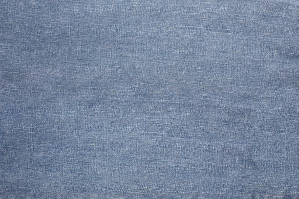 istock closeup of old Jeans denim texture background 1180754920