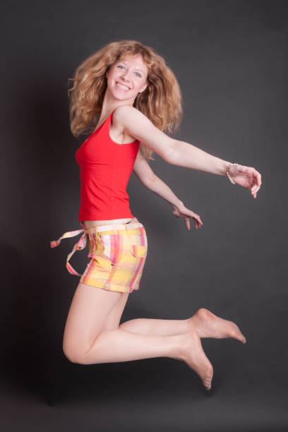 istock girl in a jumping 1180756044