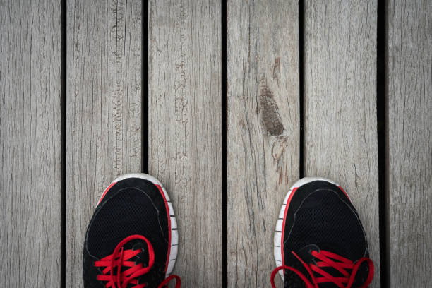 istock Wood plank stitching and shoes 1180757857