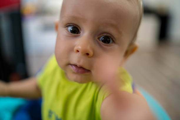 istock First steps of the boy in a baby walker 1180759385