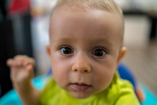 istock First steps of the boy in a baby walker 1180759391