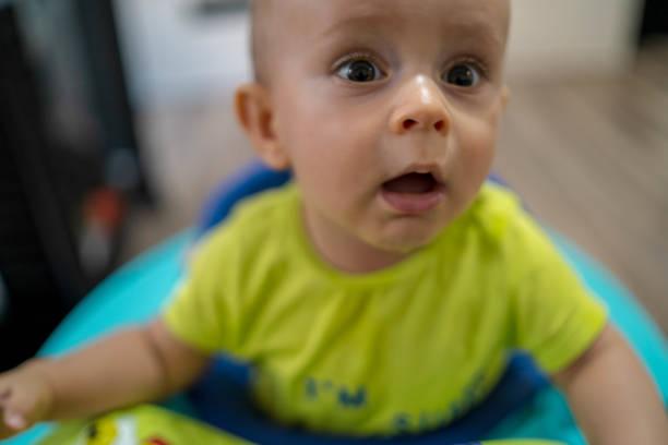 istock First steps of the boy in a baby walker 1180759403