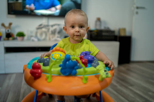 istock First steps of the boy in a baby walker 1180759436
