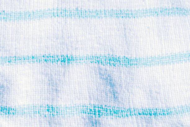 istock Abstract background, linen fabric texture with white and blue strips 1180761998